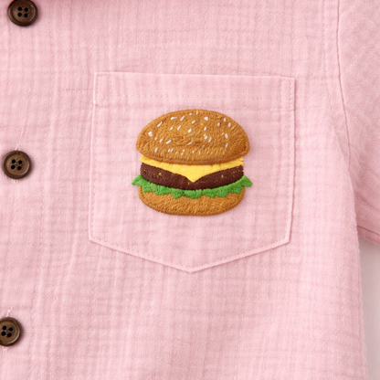 Pink shirt with a hamburger patch on the chest pocket